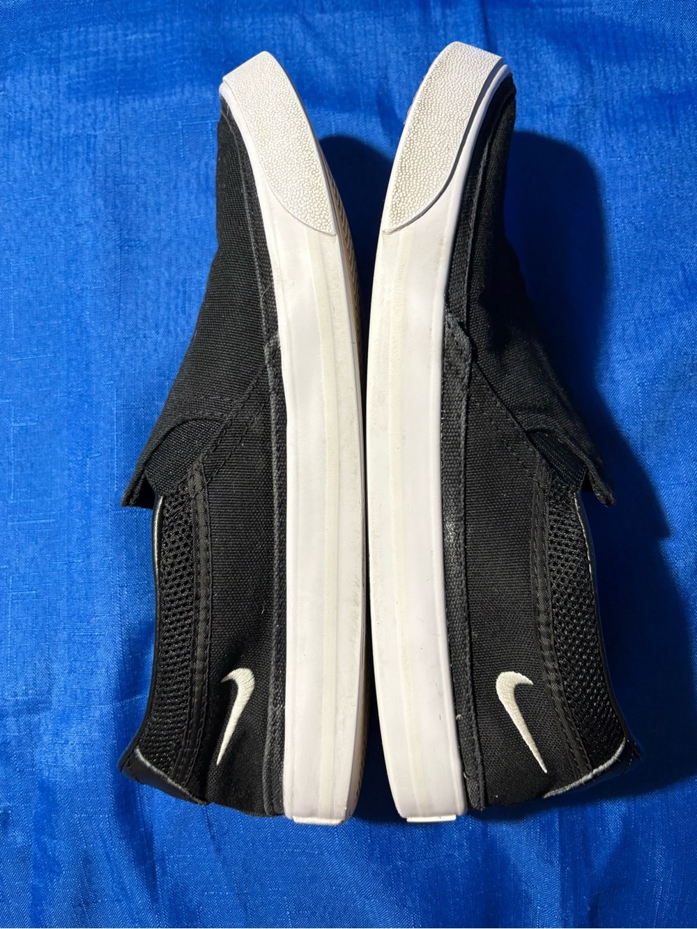 Nike Black Slip-On Canvas Sneakers with White Swoosh